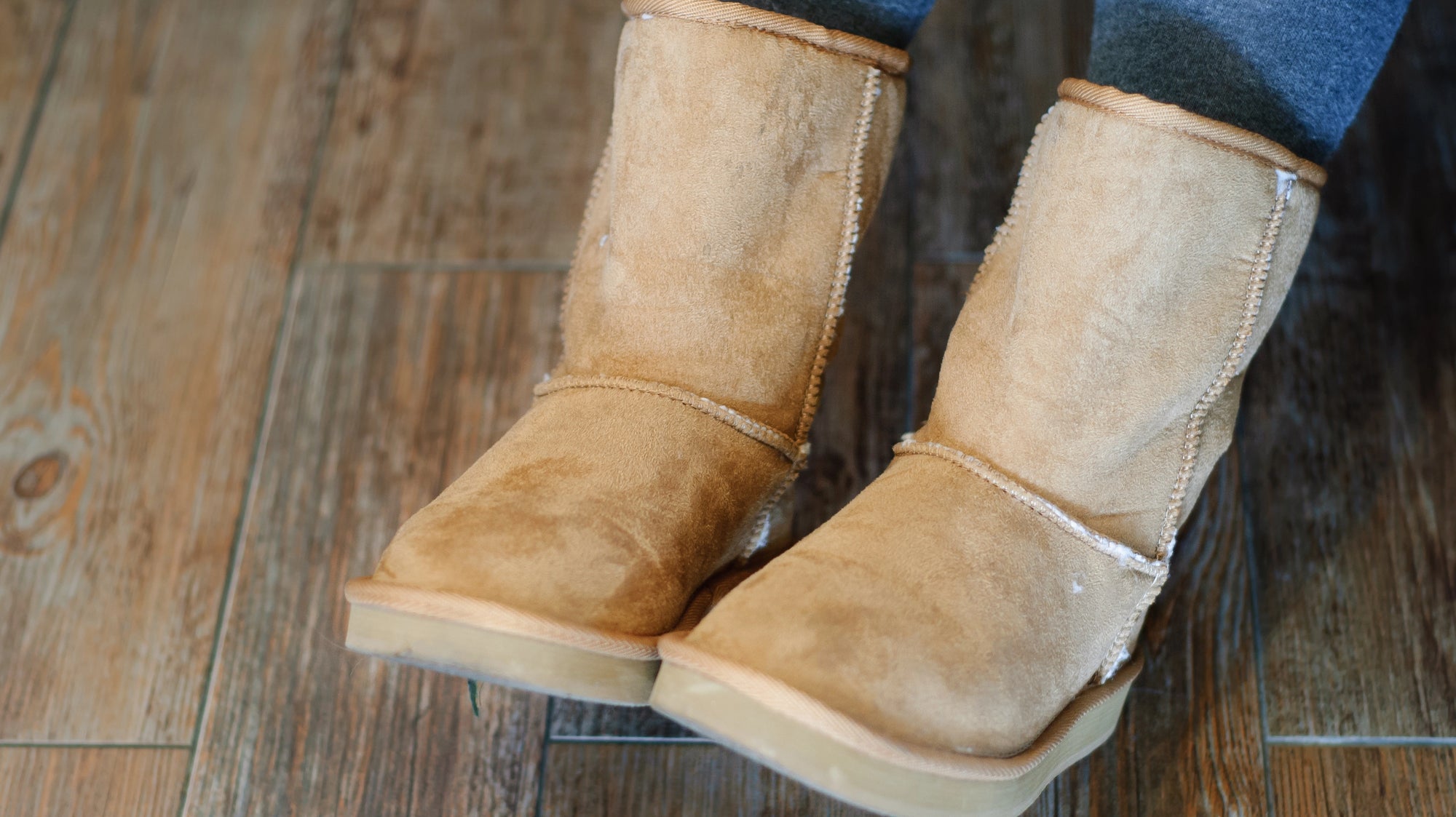 Woman wearing suede boots