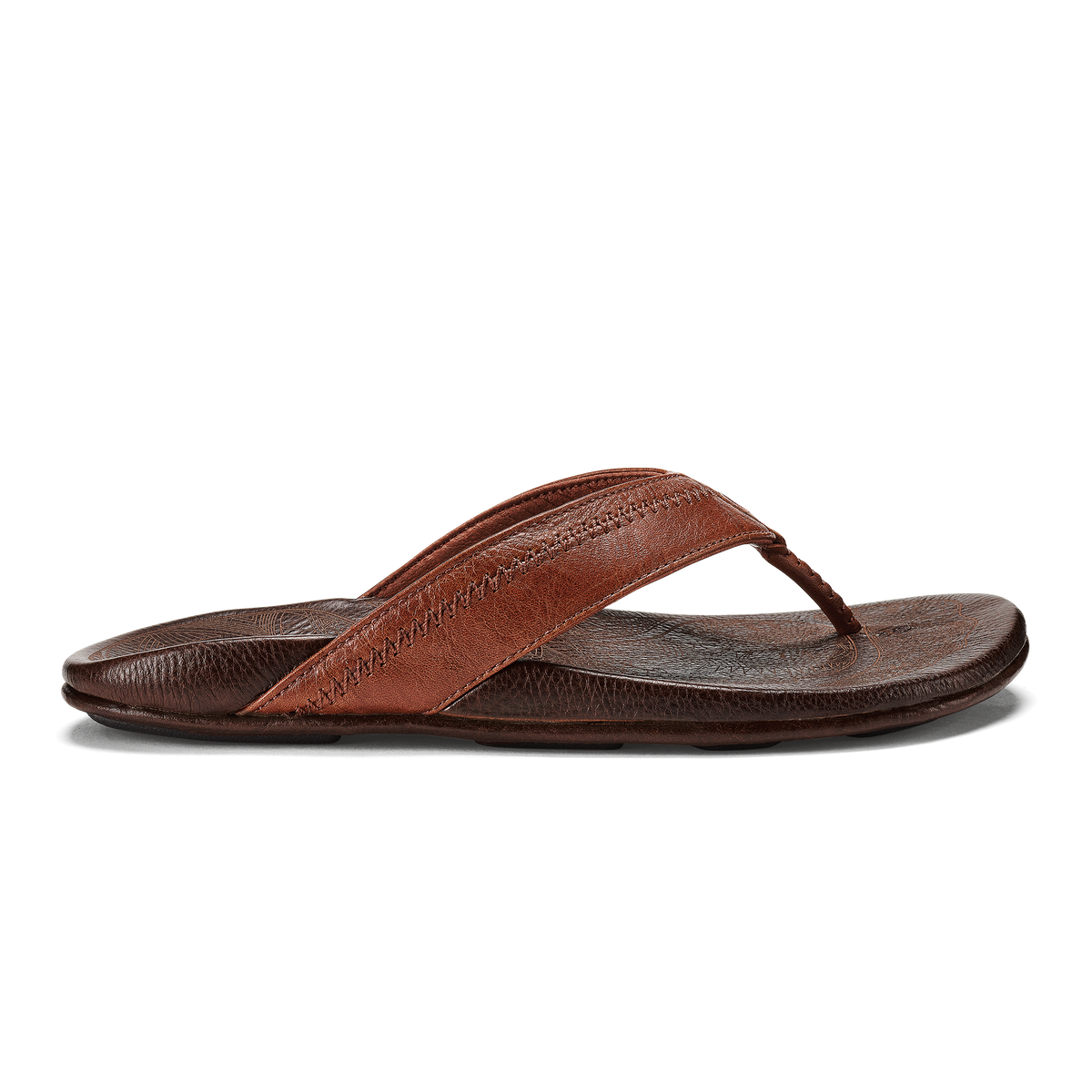 OLUKAI Men's Hiapo Rum/Dark Wood leather thong sandal, hand-sewn strap and contoured footbed, angled view.