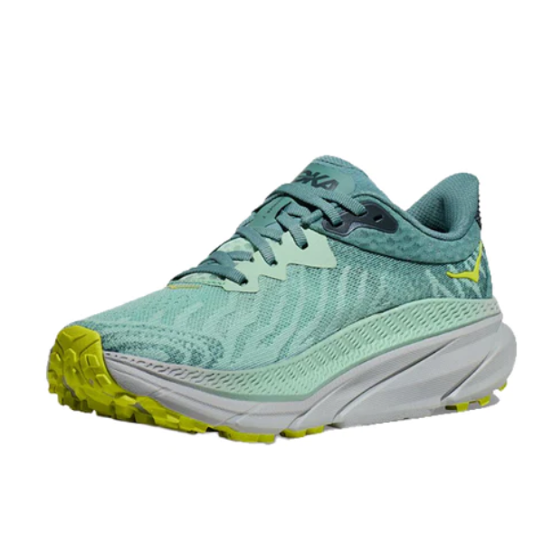 The HOKA Womens Challenger ATR 7 Wide in Mist Green/Trellis features a textured design, yellow-green toe and heel accents, and a thick white sole.