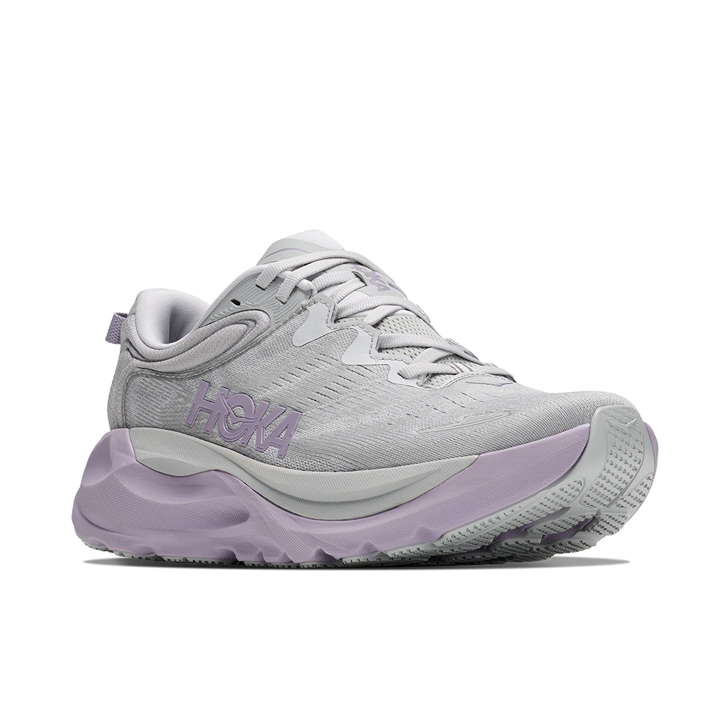 HOKA Women's Gaviota 6 Stardust/Mellow Lilac running shoe, grey mesh upper with lilac accents, side view.