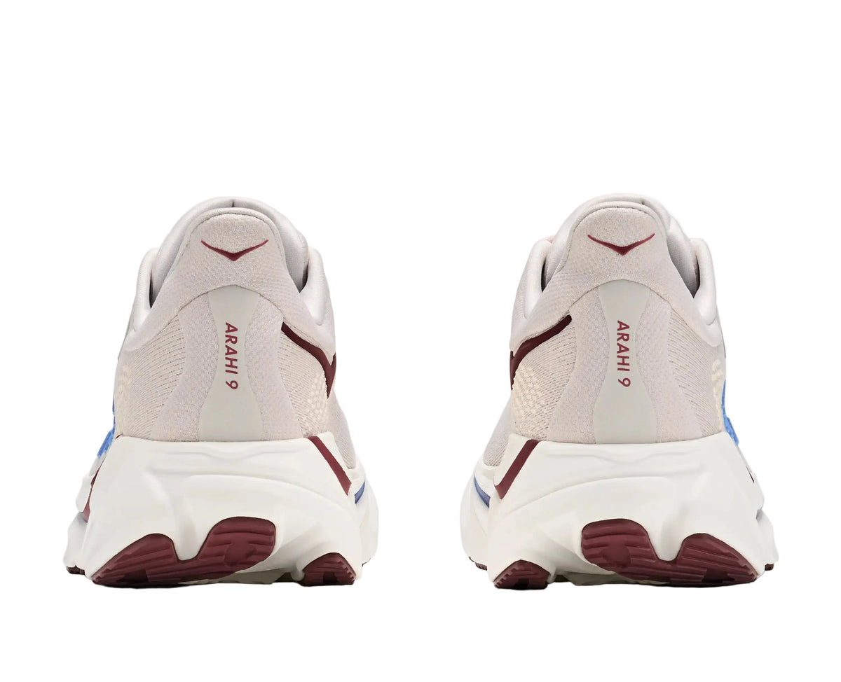 HOKA Men's Arahi 9 Stucco/Grout running shoe, padded heel counter and grey midsole, rear heel view.