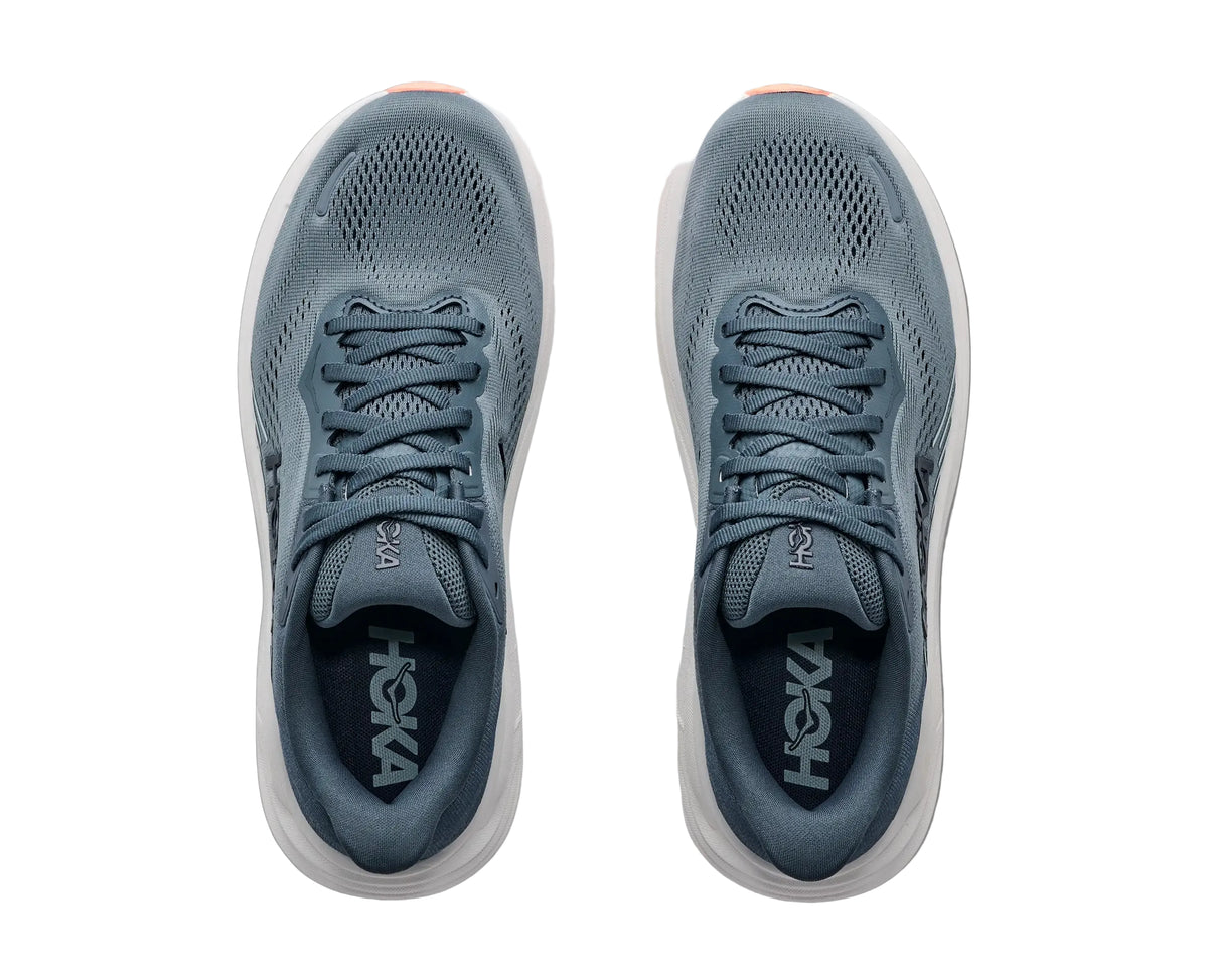 HOKA Women's Clifton 11 Navy/Gum Blue running shoe, faded navy upper with blue HOKA logo, side profile.