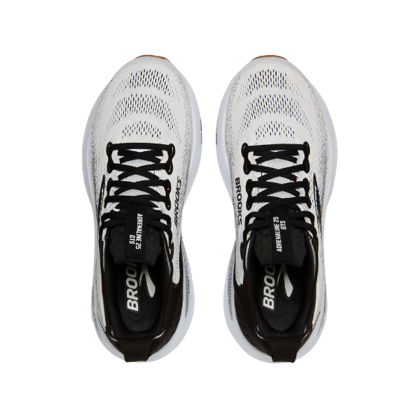 Top view of Brooks Women's Adrenaline GTS 25 Wide White/Black running shoes with black laces, displaying BROOKS branding on the insole and tongue. Shown side by side on a white background, these offer excellent support for foot pain.