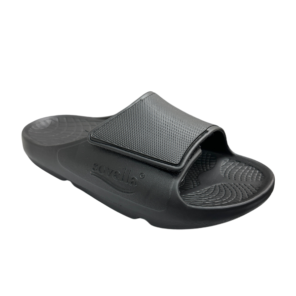 The Sovella Mens PF Velcro Slide Black features a Wide adjustable strap, textured footbed, arch support, and the SOVELLA name on the side—designed for exceptional comfort and recovery.