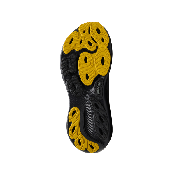 The image shows the black and yellow sole of the BROOKS Men's Adrenaline GTS 25 Wide Grey running shoe, featuring a textured tread and Brooks logo on a white background—offering ideal support for those with plantar fasciitis.