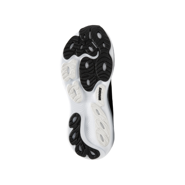 The image displays the sole of the BROOKS Women's Adrenaline GTS 25 Wide Black/White running shoe, featuring a black and white wavy tread with textured grip, shown sole-up on a plain white background.