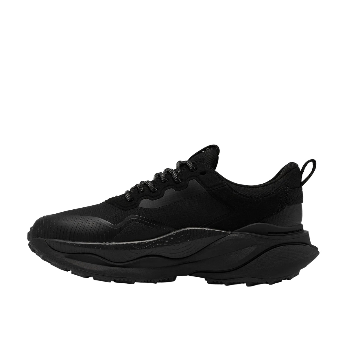 CLARKS Women's Pace Trail Go Waterproof Wide Black/Black trail shoe, TPU overlays, side profile.