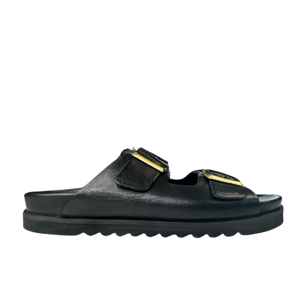 The SOVELLA Womens Olivia Black is a black leather slide with two Wide straps, large gold buckles, and a thick textured sole for extra arch support and foot pain relief.