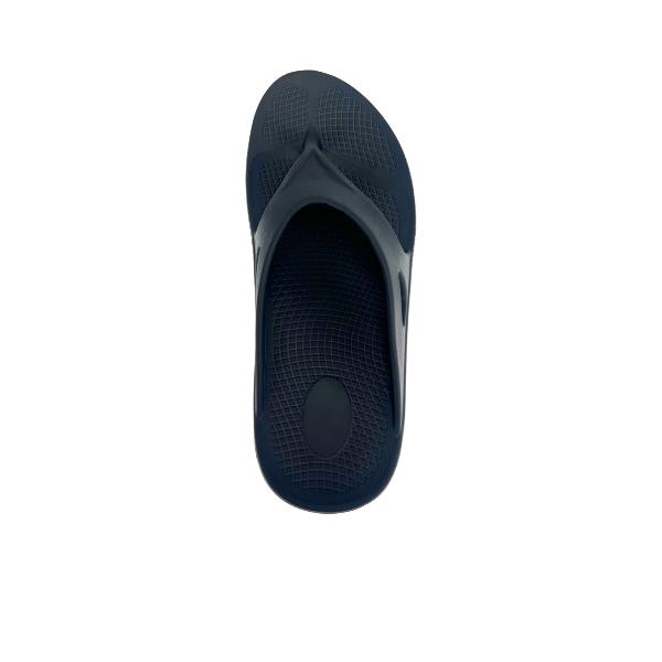 A single dark grey SOVELLA Mens PF Thong comfort recovery sandal seen from above, highlighting its textured footbed with arch support and Wide strap, on a plain white background.