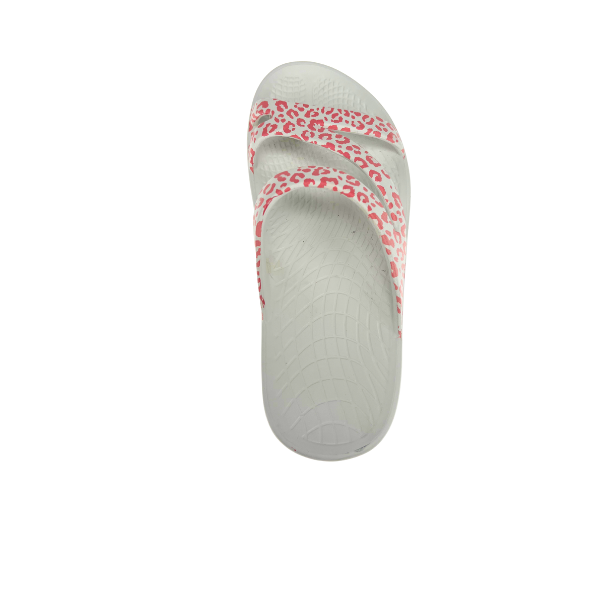 The SOVELLA Womens PF Slide Pink/Leopard sandal features two pink leopard-print straps and arch support for comfortable recovery with every step.