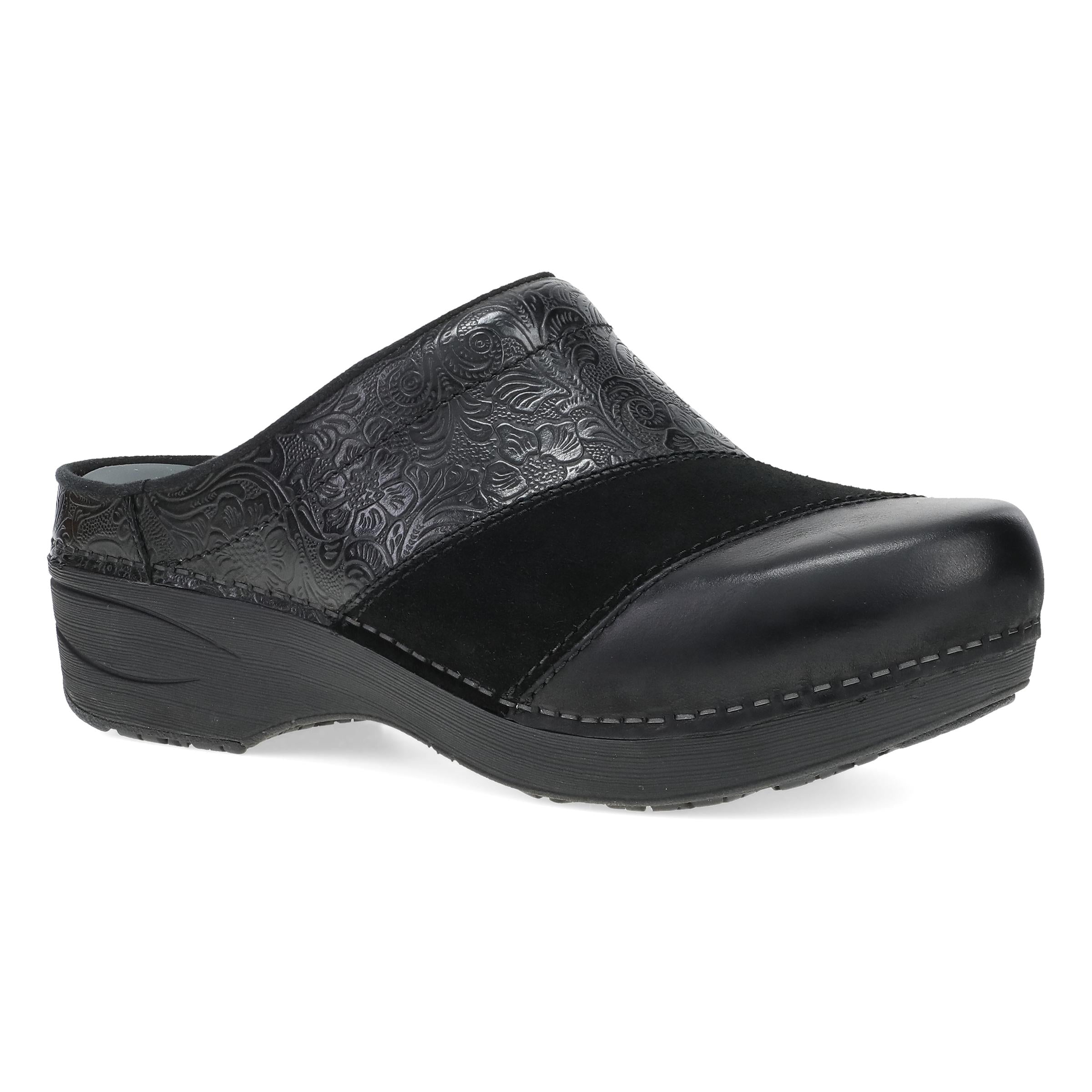 DANSKO Women's Zinnia Clog Black open-back mule, tooled black leather upper, angled side view.