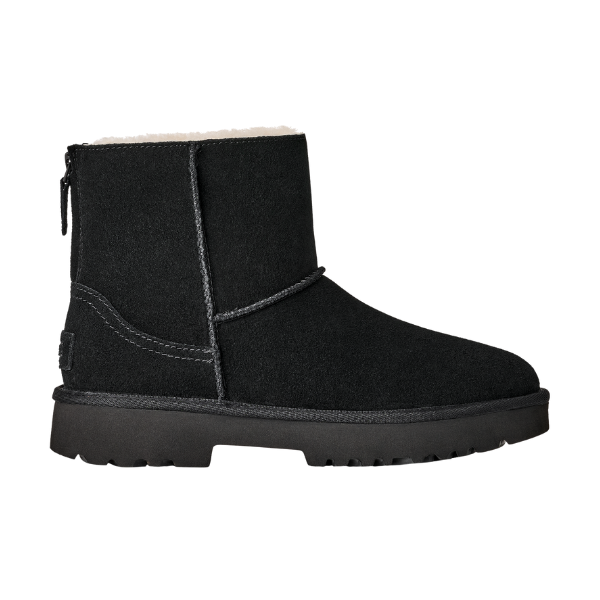 The UGG Women's Marais Zip Up Black ankle boot features black suede, visible stitching, a flat rubber sole, rounded toe, cozy sheepskin lining in the short shaft, and a convenient back zipper.