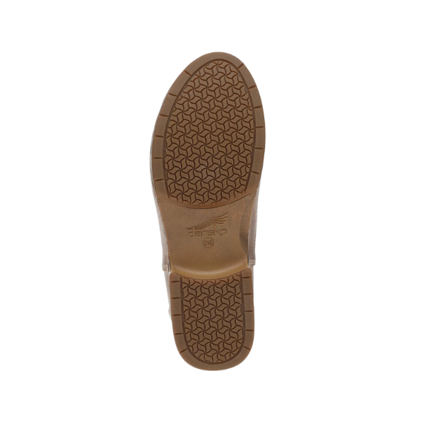Dansko Women's Michelle Tan Waxy boot sole by DANSKO with hexagonal, slip-resistant grip, shown from below on white.