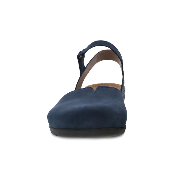 Front view of the Dansko Womens Rowan Navy by DANSKO, a single navy blue flat shoe featuring a rounded toe, ankle strap, and supportive memory foam insole, displayed against a white background.
