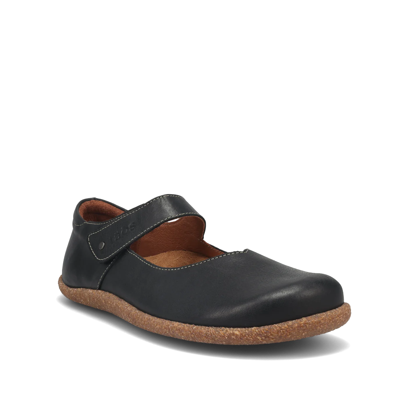 The Taos Womens Ultimate Black by TAOS is a black leather Mary Jane with a brown cork sole, rounded toe, and single snap-strap. The tan interior has a Curves & Pods footbed for comfort. Simple, casual, and orthotic-friendly.
