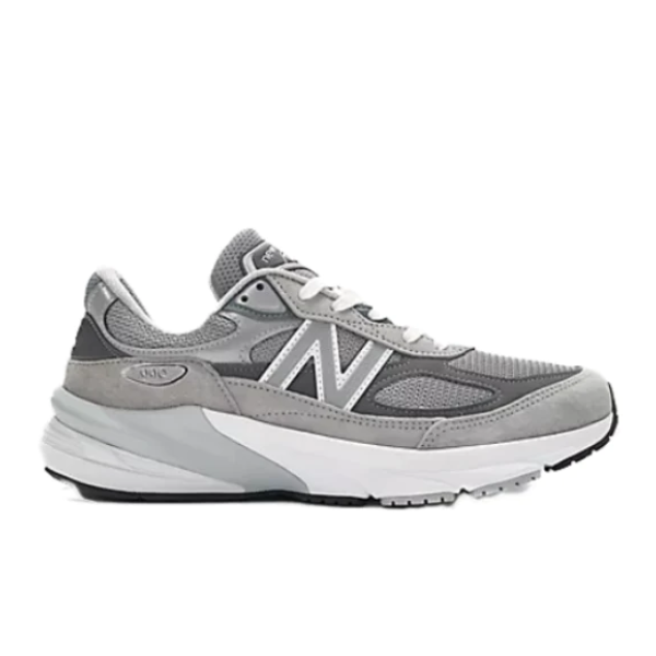 The New Balance Mens 990 v6 Wide Grey sneaker features mesh and suede panels, a bold white N logo, and a thick white and grey ENCAP-cushioned sole, shown against a white background.