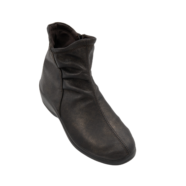 The ARCOPEDICO Arcopedico Womens Paluma Bronze is a brown vegan ankle boot with a side zipper, slightly wrinkled texture, round toe, and built-in arch support for all-day comfort, shown against a white background.