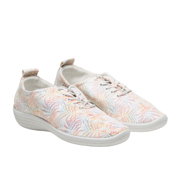 The ARCOPEDICO Womens Lanin White Multi sneakers feature a subtle multicolored pattern, dual arch support, and textured soles, making them a comfortable travel shoe—shown on a white background.