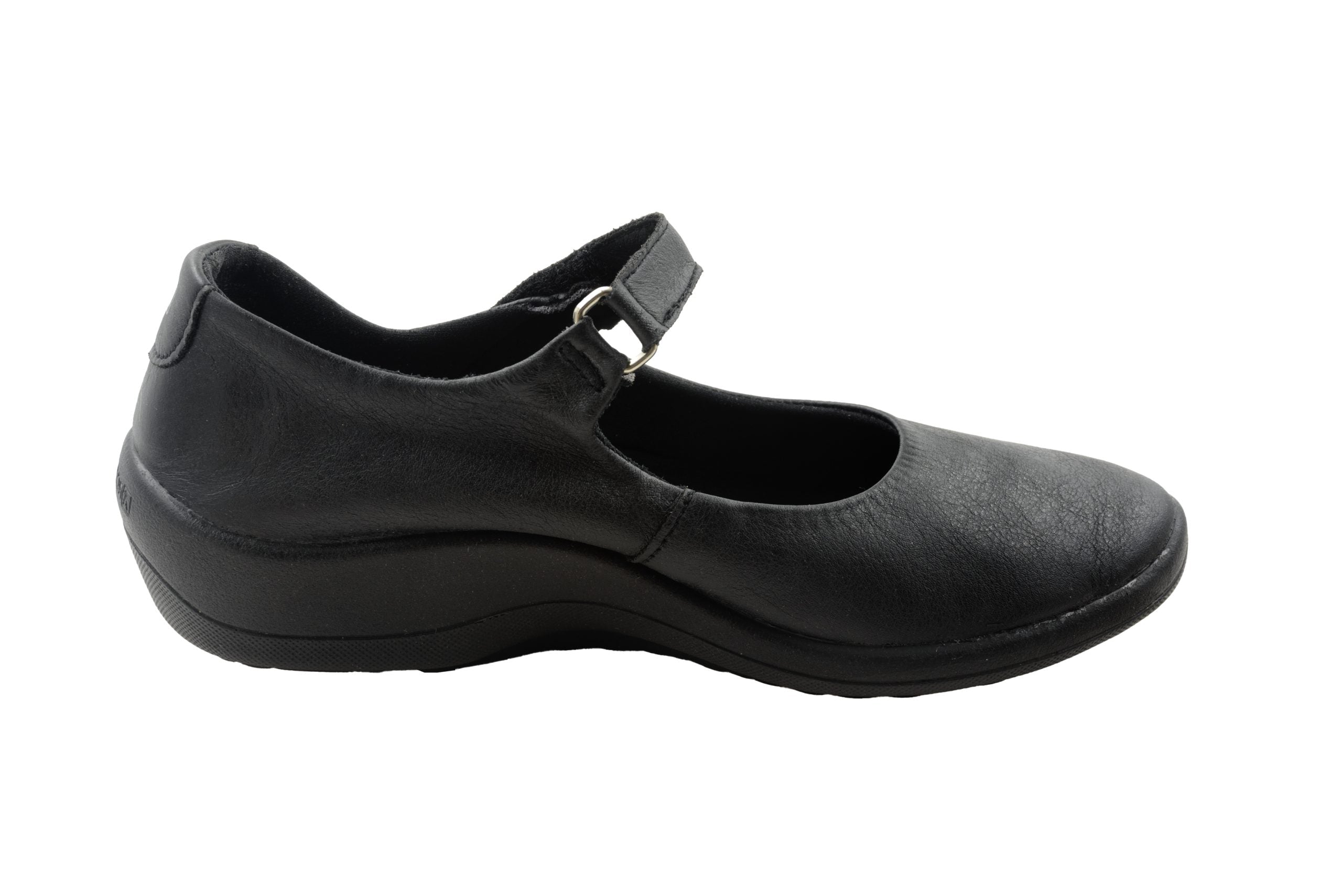 The ARCOPEDICO Womens Thy Black features a black leather Mary Jane design with a low wedge heel, single instep strap, and reliable arch support, shown from the side against a white background.