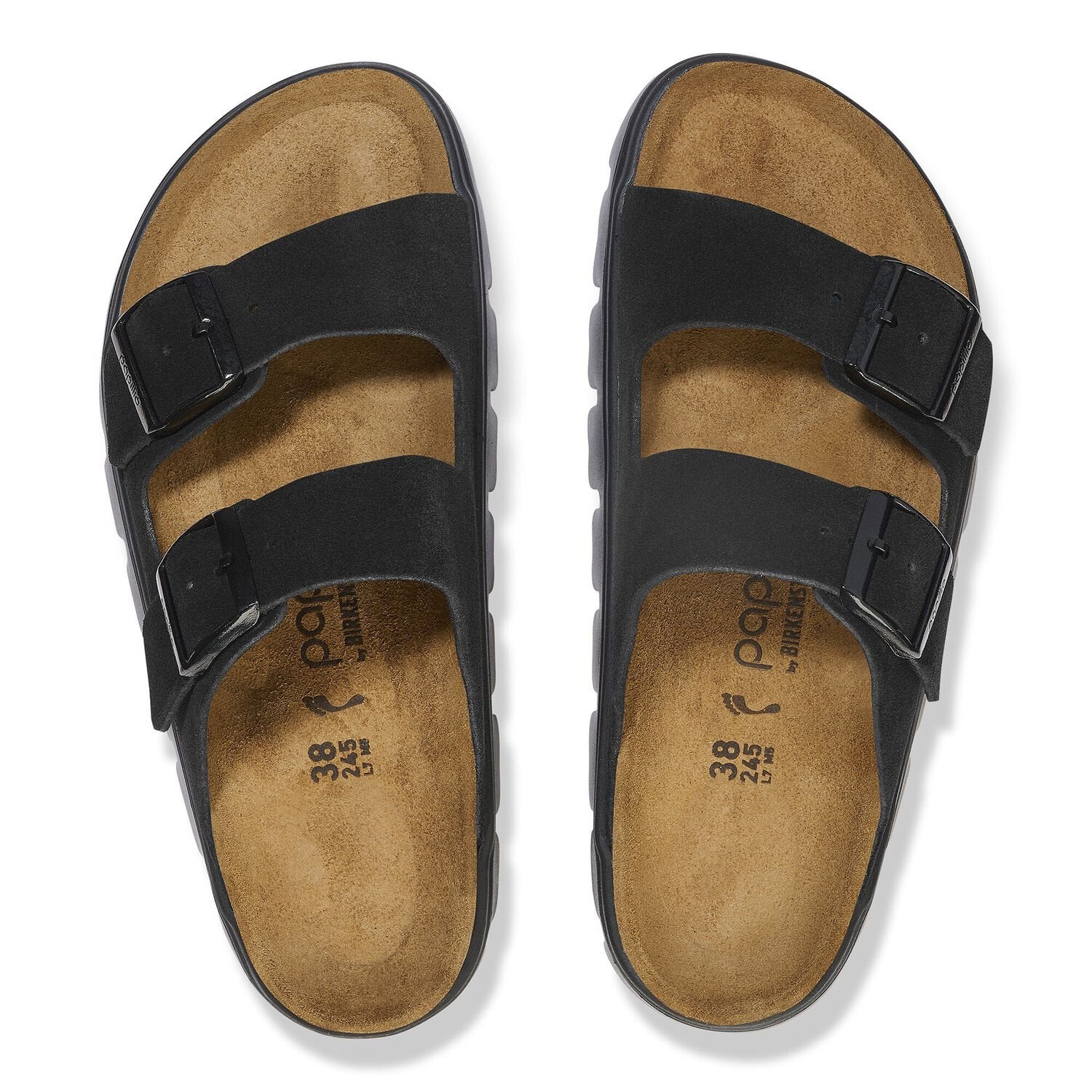 A pair of Birkenstock Womens Arizona Platform Black sandals by BIRKENSTOCK featuring two straps with buckles and tan contoured footbeds, shown from above.
