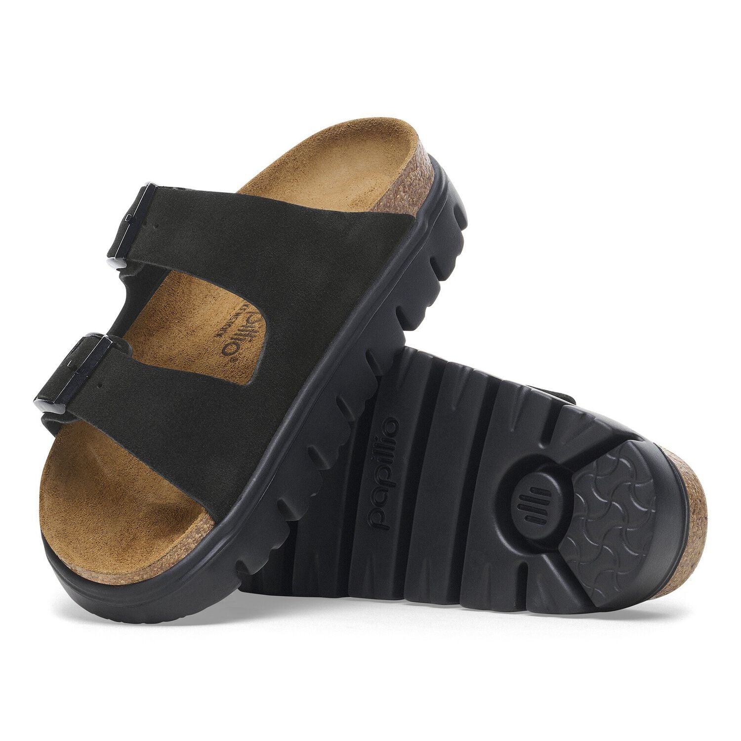 The BIRKENSTOCK Womens Arizona Platform Black features two adjustable straps and a contoured footbed. One sandal stands upright, while the other reveals its ridged black rubber outsole.