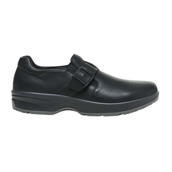 The Birkenstock Womens Caris Pro Leather Black by BIRKENSTOCK is a black leather dress shoe with a single Wide strap and buckle, low heel, and slip-resistant PU outsole. Shown in side profile against a white background.