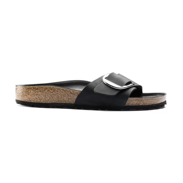 The Birkenstock Womens Madrid Big Buckle Black sandal features a cork footbed, Wide oiled nubuck leather strap, and large silver buckle. Shown in profile on a white background.