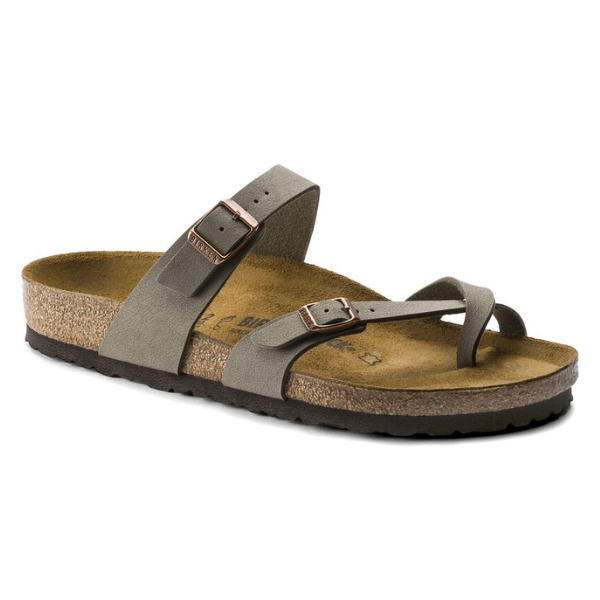 The BIRKENSTOCK Womens Mayari Stone sandal features a cork footbed, grey suede straps with two adjustable metal buckles, and a black textured sole. One strap crosses the foot, while another loops around the big toe for comfort.