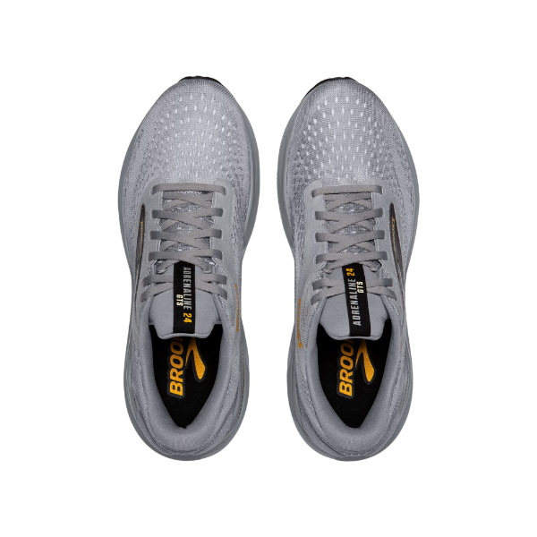 Top view of Brooks Mens Adrenaline GTS 24 Wide Grey running shoes with mesh uppers, black insoles, yellow “BROOKS” branding, subtle black/yellow accents, and GuideRails® support for comfortable runs.