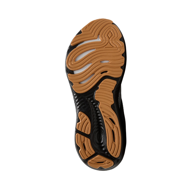 The image shows the sole of the BROOKS Mens Glycerin GTS 22 White/Grey/Black with a wavy, textured tan and black tread and plush cushioning, viewed from the bottom against a white background.