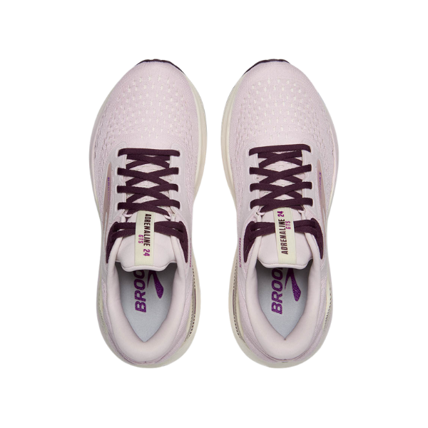 The BROOKS Womens Adrenaline GTS 24 Pink features a light pink design with dark purple laces and details. Viewed from above, BROOKS is printed on the inner soles in purple, and tongue tags show ADRENALINE 24. GuideRails provide stable, breathable comfort.