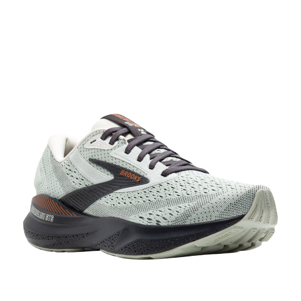 The Brooks Womens Adrenaline GTS 24 Wide in Green/Black features a breathable mesh upper, plush cushioning for foot pain relief, and BROOKS branding. The shoe is angled to showcase its side and front.