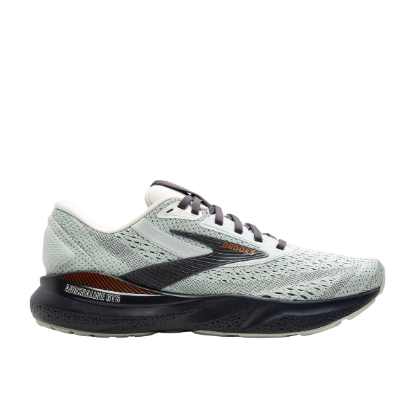 The Brooks Womens Adrenaline GTS 24 Wide Green/Black features a mesh upper, black sole, orange accents, white laces, cushioned heel, and GuideRails® support for foot pain relief. Side profile shows BROOKS branding.