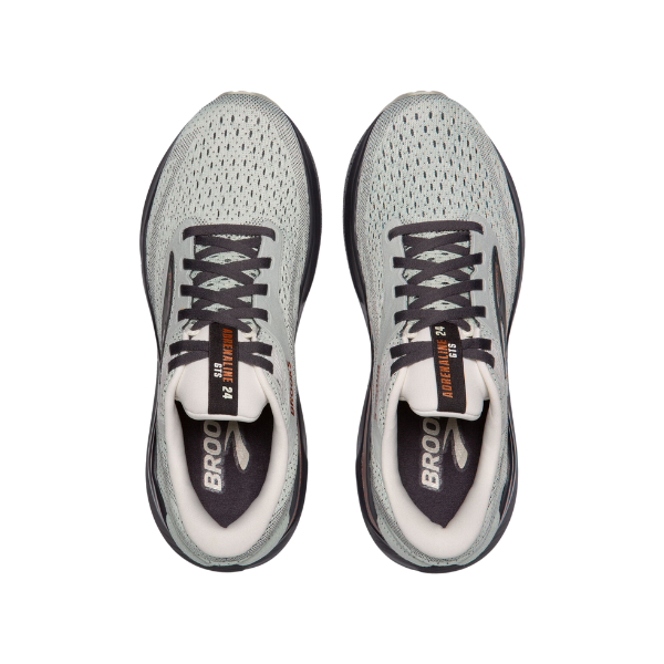 Top view of BROOKS Adrenaline GTS 24 Womens Wide running shoes in green/black, featuring GuideRails® support for stability and pain relief. BROOKS is on the insole. Shoes are on a white background.