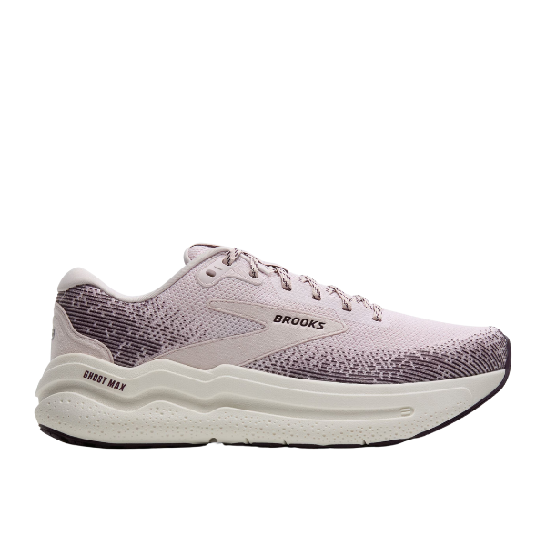 The BROOKS Womens Ghost Max 2 Orchid is a light pink running shoe with dark pink accents, a white midsole, lace-up closure, and textured outsole. BROOKS and GHOST MAX are printed on the side. Designed for foot pain relief.