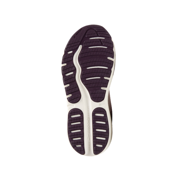 The dark purple sole of the BROOKS Womens Ghost Max 2 Orchid running shoe is shown from below, highlighting its segmented tread and textured grooves for grip, flexibility, and foot pain relief against a white background.