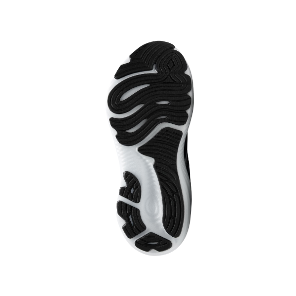 The image displays the sole of the BROOKS Womens Glycerin GTS 22 Black/White, highlighting its wavy, textured tread for traction and flexibility, along with plush cushioning for superior comfort.