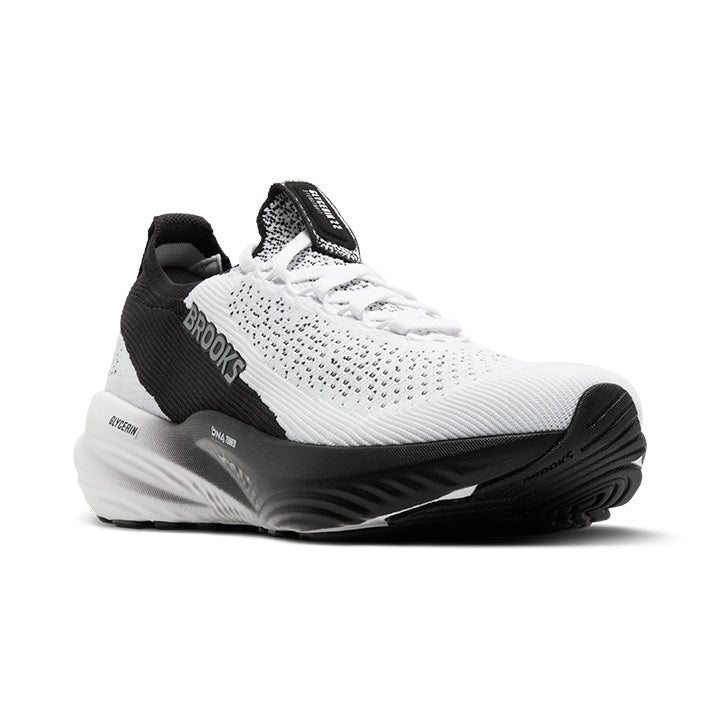 The BROOKS Womens Glycerin StealthFit 22 White/Black running shoe features a DNA-tuned midsole, breathable mesh upper, and a sleek design. Shown angled to highlight both the side and front views.