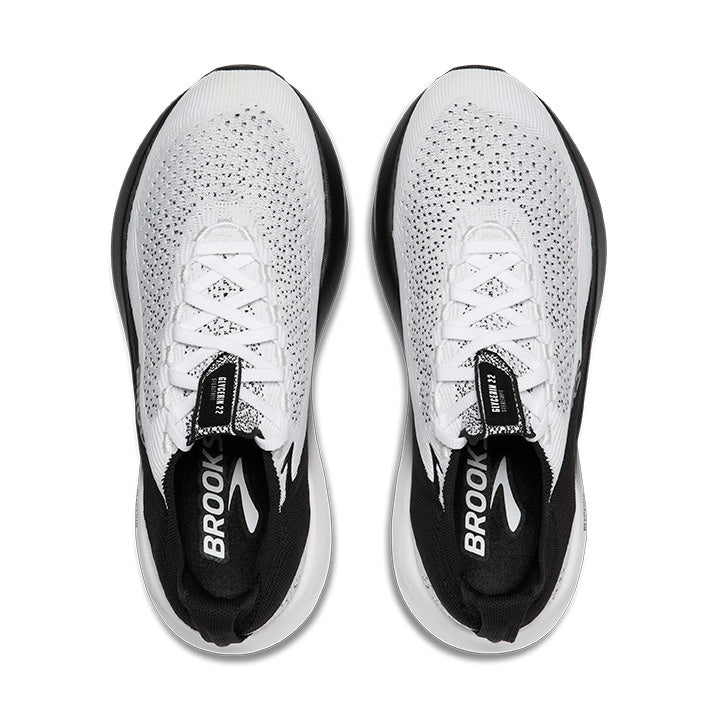 Top view of BROOKS Womens Glycerin StealthFit 22 White/Black running shoes with black soles and accents, knit texture, DNA-tuned midsole, and BROOKS visible on the insoles.