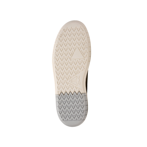 The image shows the sole of the CLARKS Mens Courtlite 2 Run Grey, featuring a geometric tread with chevrons and triangles, a gray heel, off-white forefoot, all on a lightweight EVA sole.