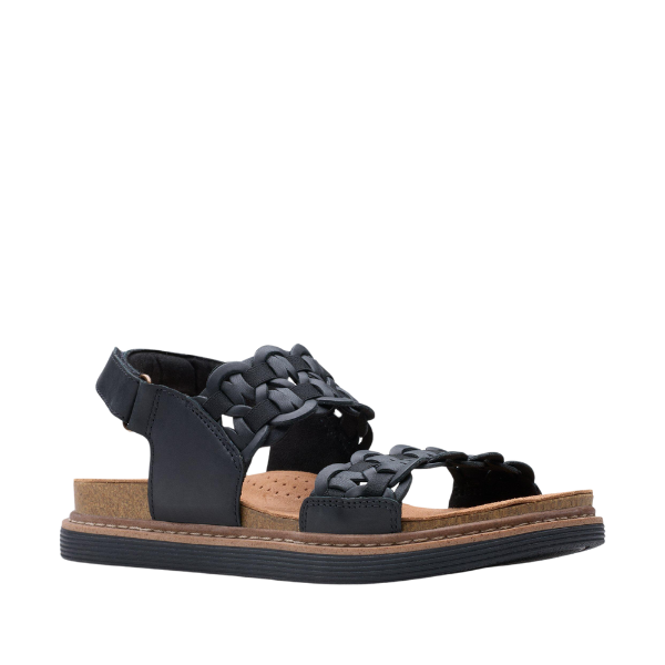 The Clarks Womens Arwell Glide Wide Black sandal features a woven black nubuck leather upper, open toe, Contour Cushion footbed, adjustable ankle strap, and a cork/TPR sole with visible edge stitching.