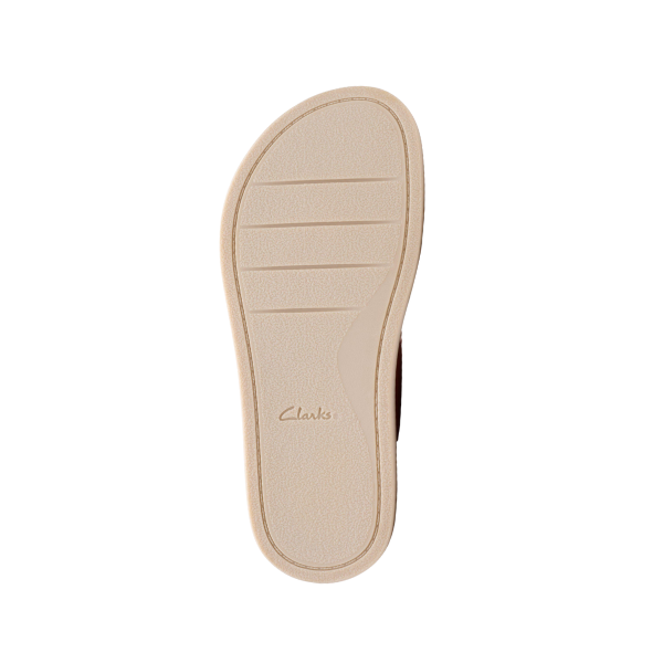The Clarks Womens Arwell Glide Wide Orange features a beige rubber sole with three horizontal grooves by the toe and the CLARKS logo stamped at the heel, seen from below on a white background—engineered with a Contour Cushion Footbed for comfort.