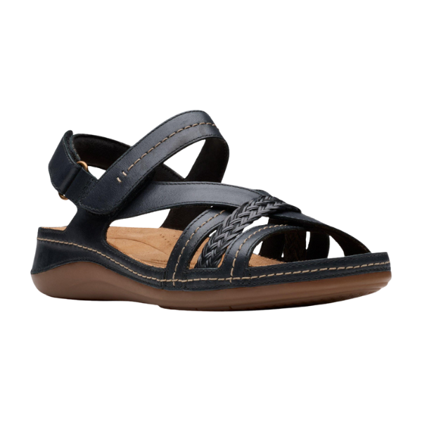 The Clarks Womens Cecily Strap Leather Wide Black Combo sandal by CLARKS features two adjustable straps, a braided front design, contrast stitching, an open toe and heel, a tan sole, and a Contour Cushioned footbed for all-day comfort.