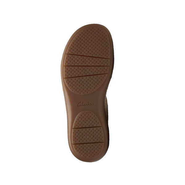 The image displays the sole of the Clarks Womens Cecily Strap Leather Wide Cream sandal, featuring a textured grip and embossed CLARKS logo on a white background, showcasing its comfortable footwear design.