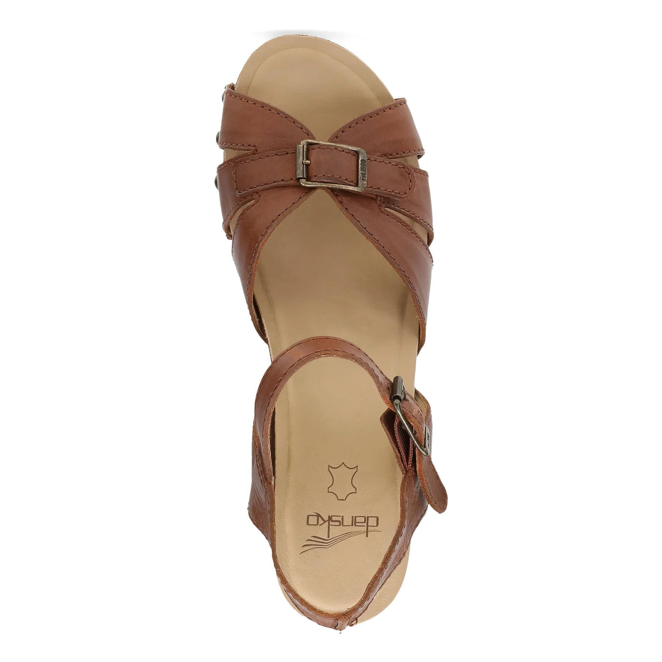 Top view of the Dansko Womens Alanna Tan sandal by DANSKO, featuring crisscross straps, a closed heel, side buckle closure, cushioned insole for comfort, and an elegant heel.