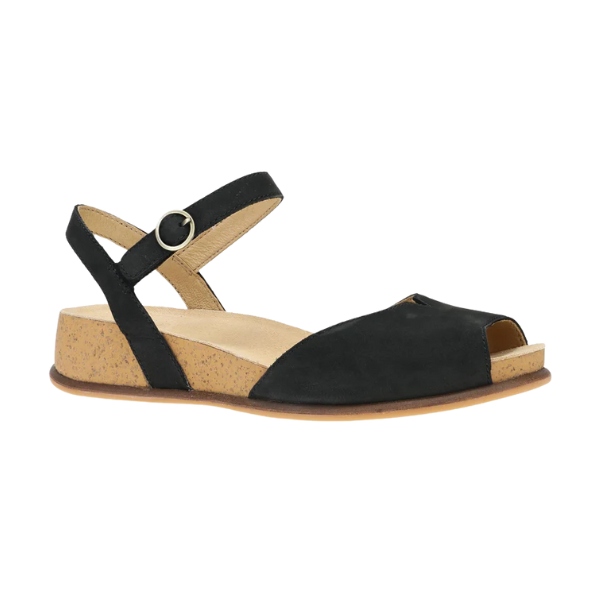 The Dansko Womens Cass Black Nubuck by DANSKO is a black open-toe sandal with a low cork wedge heel, ankle strap with buckle, and tan cushioned insole for comfort and foot pain relief in a casual design.