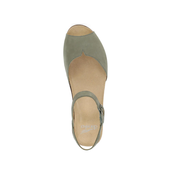 Top view of the Dansko Womens Cass Sage Nubuck sandal by DANSKO features a muted green peep toe, closed heel, ankle strap with buckle, beige insole, and visible logo—designed for both style and foot pain relief.