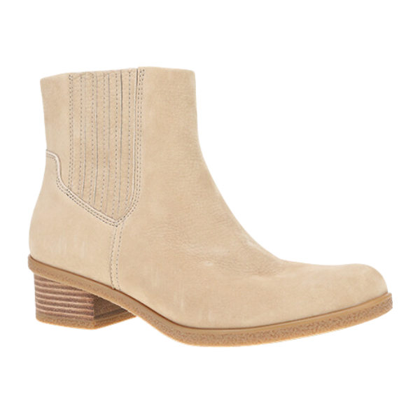 Dansko Womens Daisie Waterproof Sand ankle boot by DANSKO features a low stacked heel, elastic side panels, rounded toe, and Natural Arch technology, displayed on a white background.