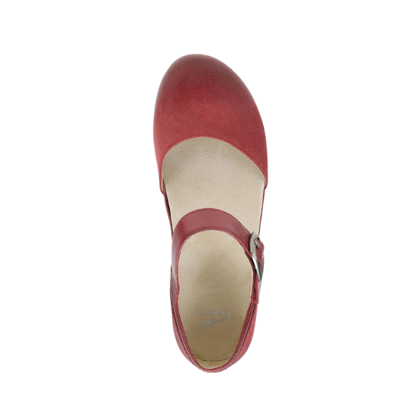 Top view of the Dansko Womens Mae Red Suede Mary Jane shoe by DANSKO, featuring a buckle strap across the instep and lightweight EVA and cork soles, shown on a white background.