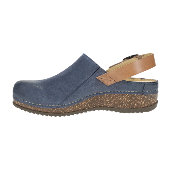 The DANSKO Womens Merrin Blue is a sustainable leather mule with a closed toe, tan adjustable slingback, cork-textured midsole, and rubber outsole—styled for comfort and pain relief. Shown in side profile on a white background.